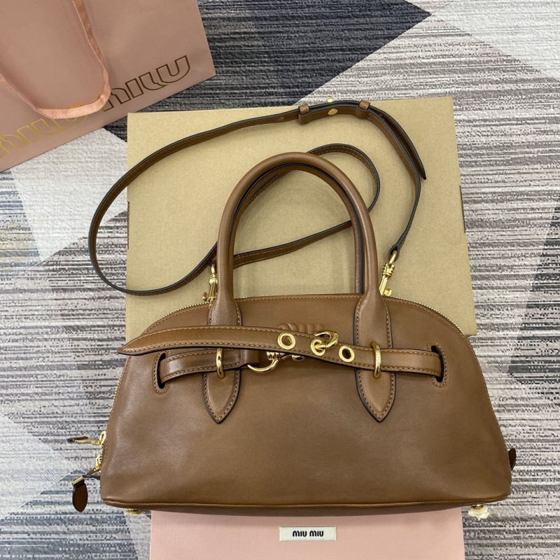 G*u*i top handle bags